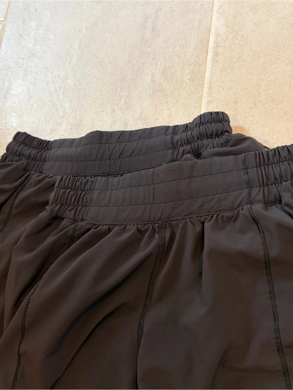 Lululemon Black Hotty Hot 4” low rise shorts — 2 PAIRS